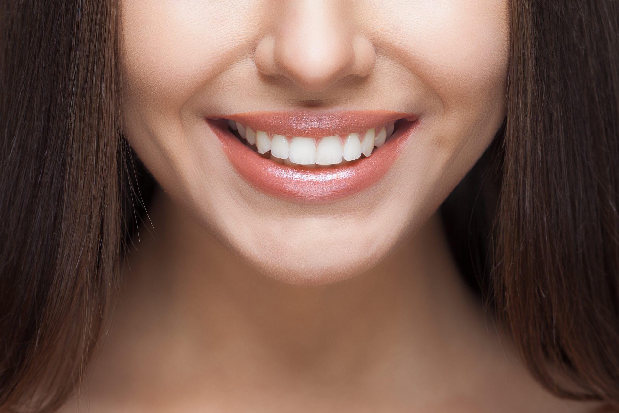 Wide Smiling White Teeth of a Woman